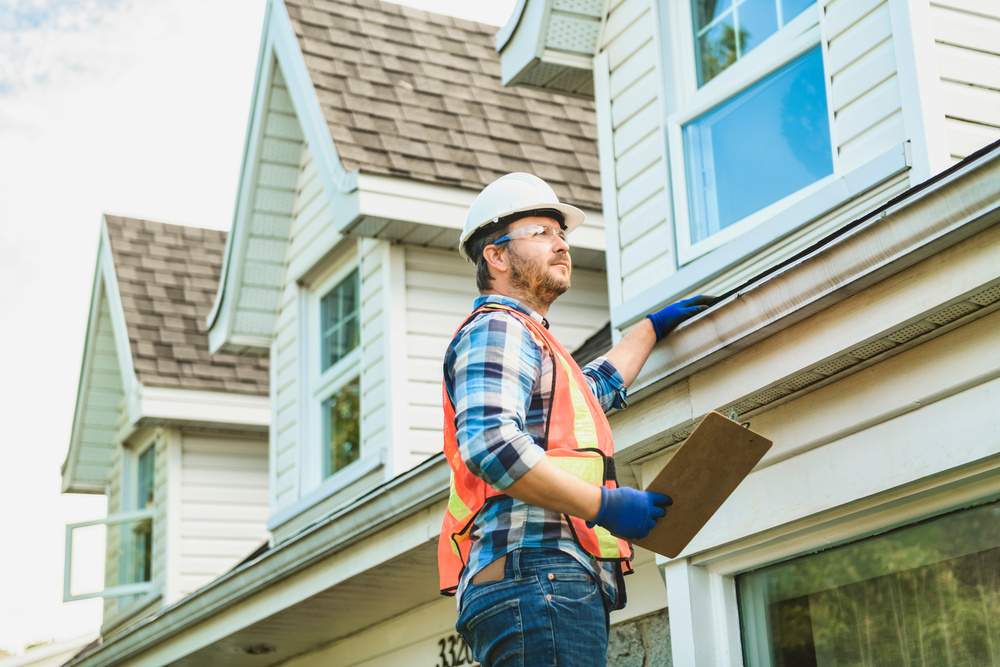 a roofer doing roofing inspections